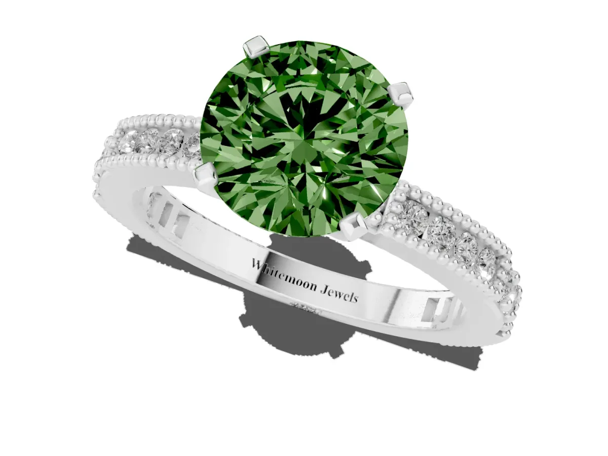 Fancy Green Round Cut Solitaire with Pavé Band and Four-Prong Setting Silver