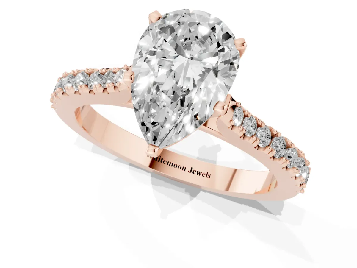 Pear Cut Cut Solitaire Diamond Engagement Ring with Pave Band and Four-Prong Setting Rose gold