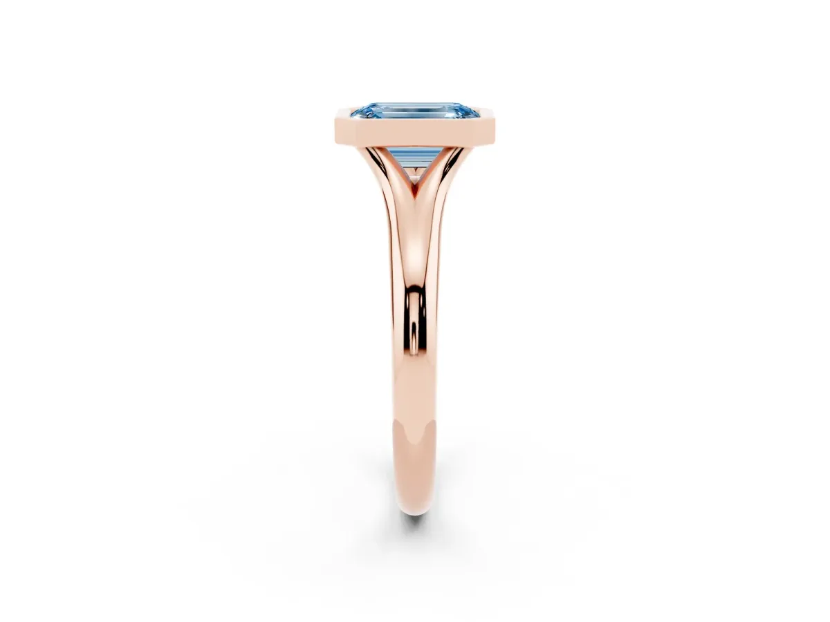 Fancy Blue Bezel Set Emerald Cut Solitaire Diamond Ring with Smooth Band Rose gold