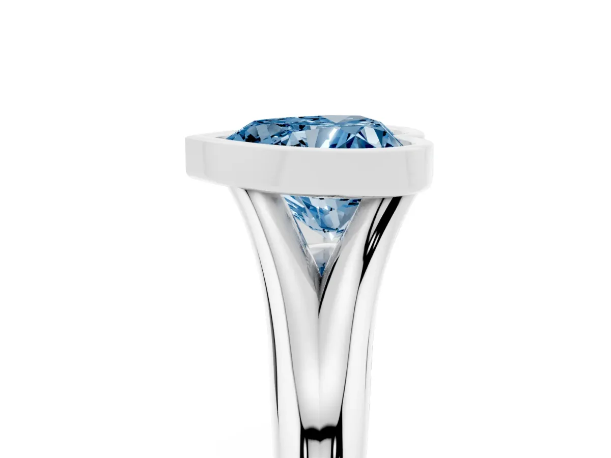 Fancy Blue Bezel Set Heart Cut Solitaire Diamond Ring with Smooth Band Platinum