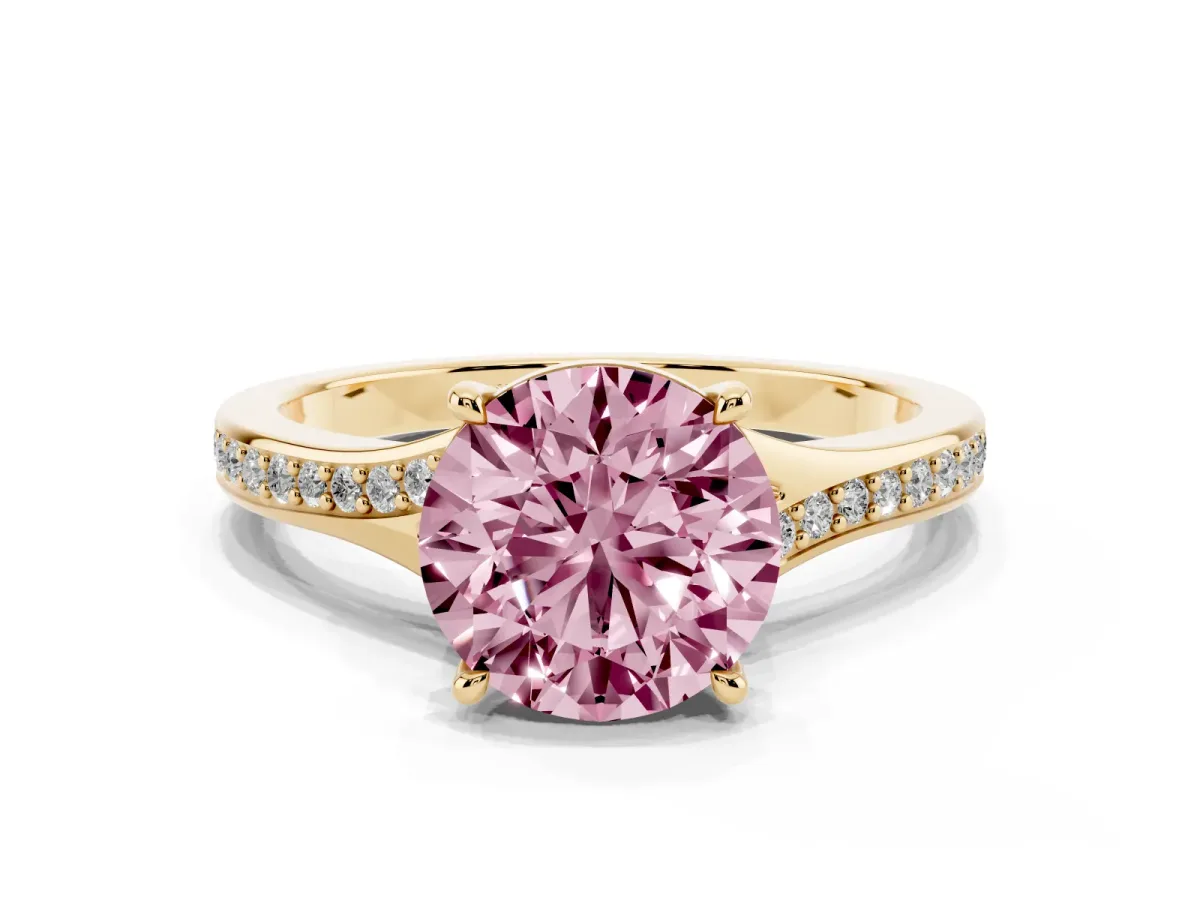 Fancy Pink Round Cut Diamond Solitaire Ring with Pavé Band and Prong Setting Yellow gold