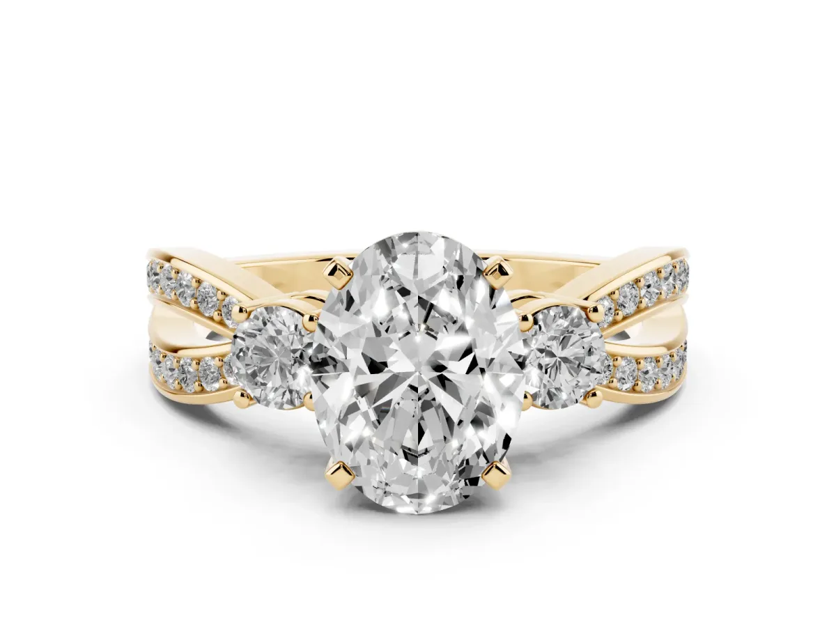 Three-Stone Oval Cut Cut Diamond Twist Band with Prong Setting Yellow gold