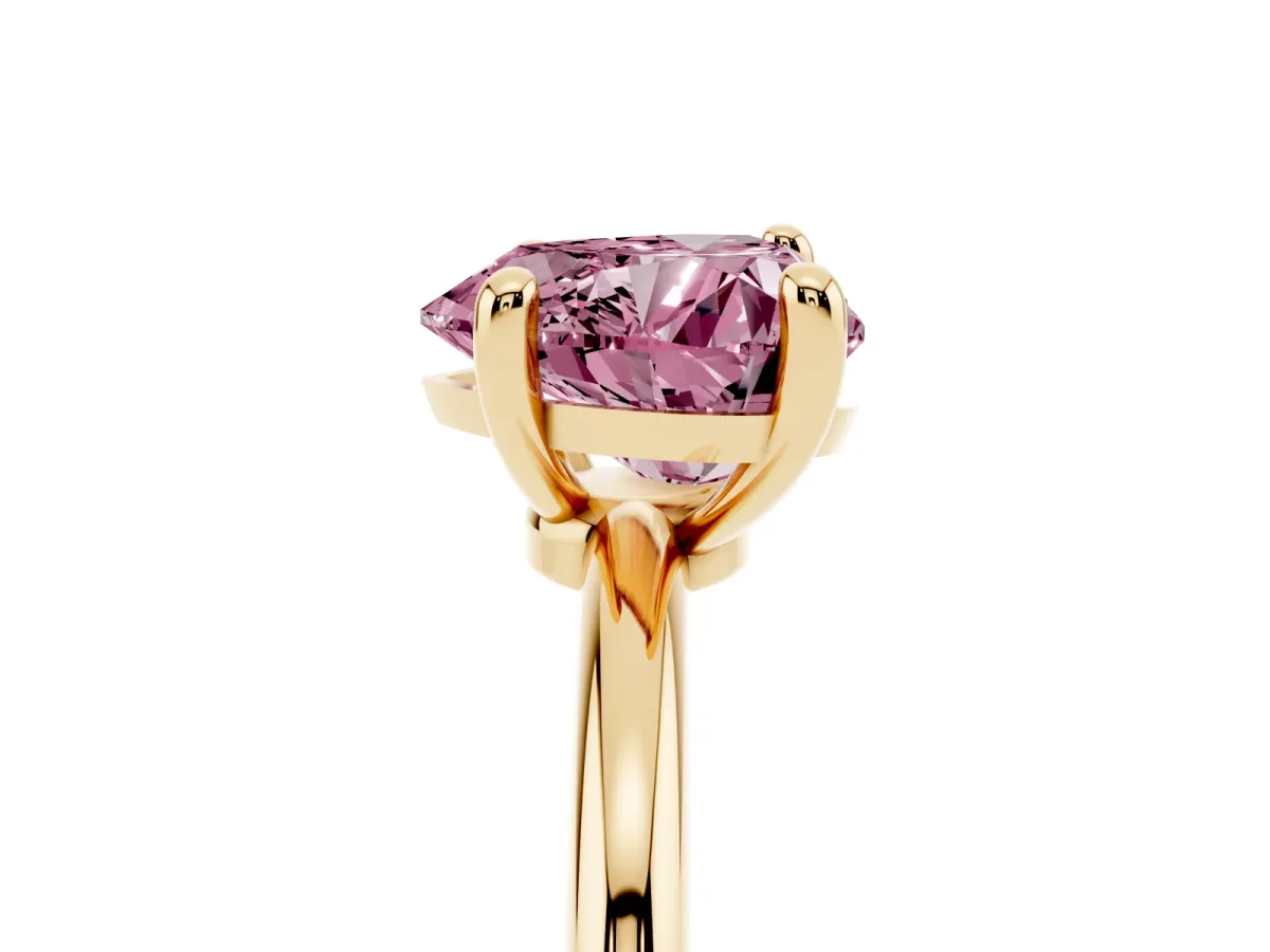 Fancy Pink Heart Cut Solitaire Diamond Ring with 4-Prong Setting on a Classic Band Yellow gold