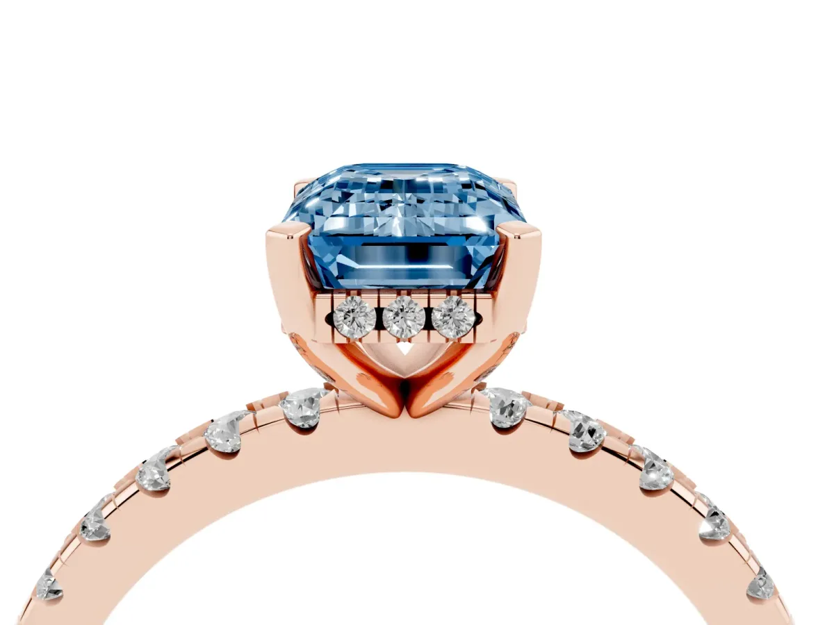 Fancy Blue Emerald Cut Diamond Solitaire Ring with Round Pavé Band and Four-Prong Setting Rose gold