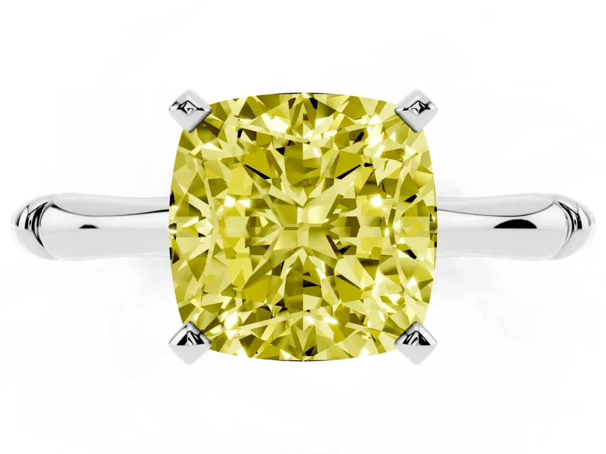Fancy Yellow Cushion Cut Solitaire Diamond Ring with Bamboo Band and Four-Prong Setting Platinum