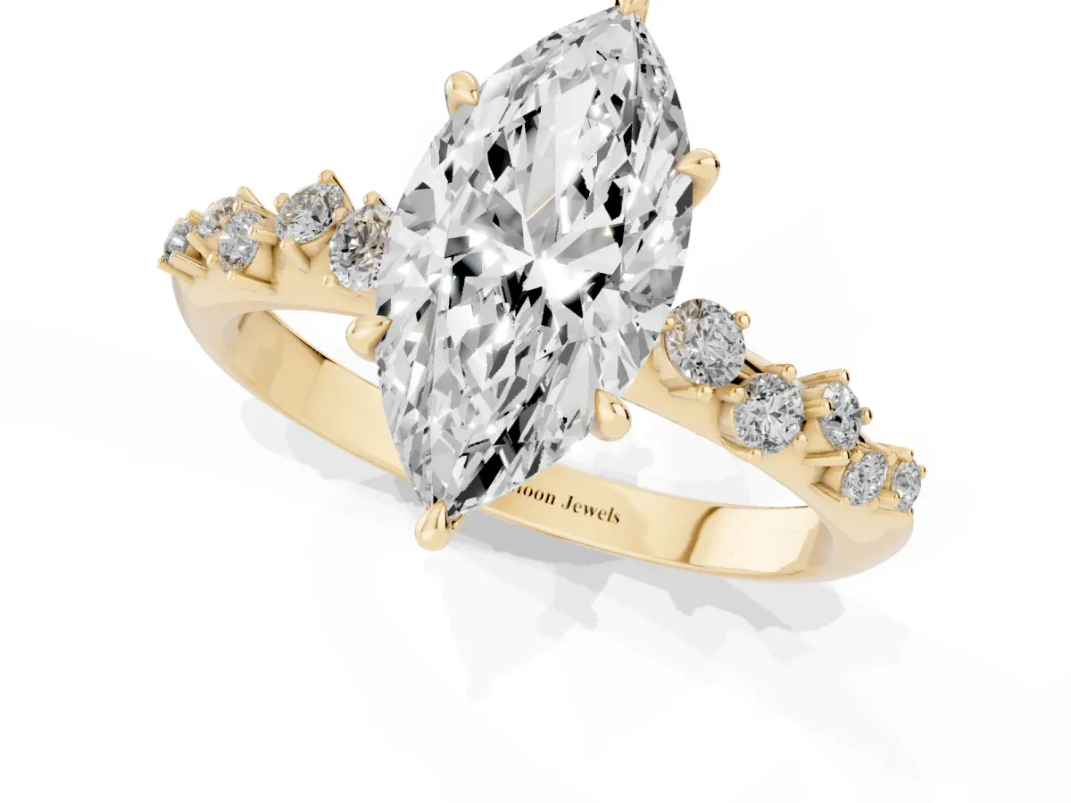 Marquise Cut Diamond Cluster Side Stone Solitaire Ring with Prong Setting Yellow gold