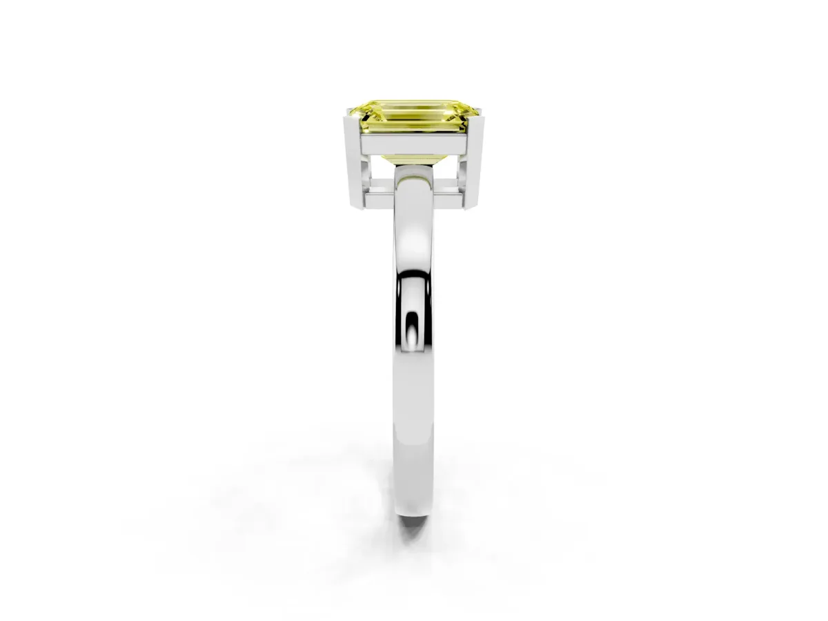Fancy Yellow Emerald Cut Cut Solitaire Ring with Four-Prong Setting and Classic Band Silver