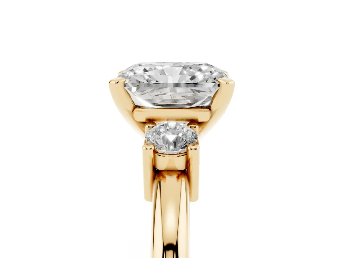 Three-Stone Radiant Cut Cut Diamond Solitaire with Prong Setting and Classic Band Yellow gold