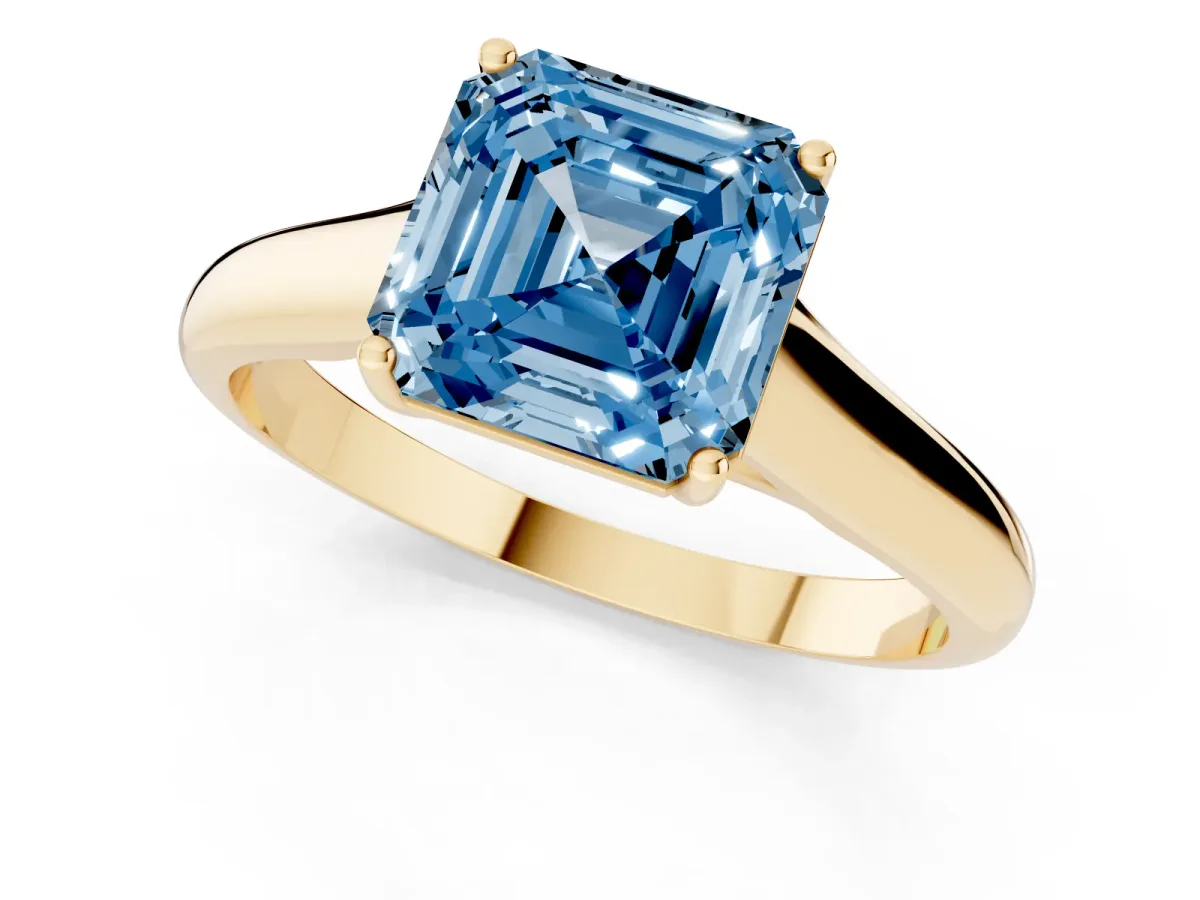 Fancy Blue Asscher Cut Solitaire Engagement Ring with Tapered Band and Four-Prong Setting Yellow gold