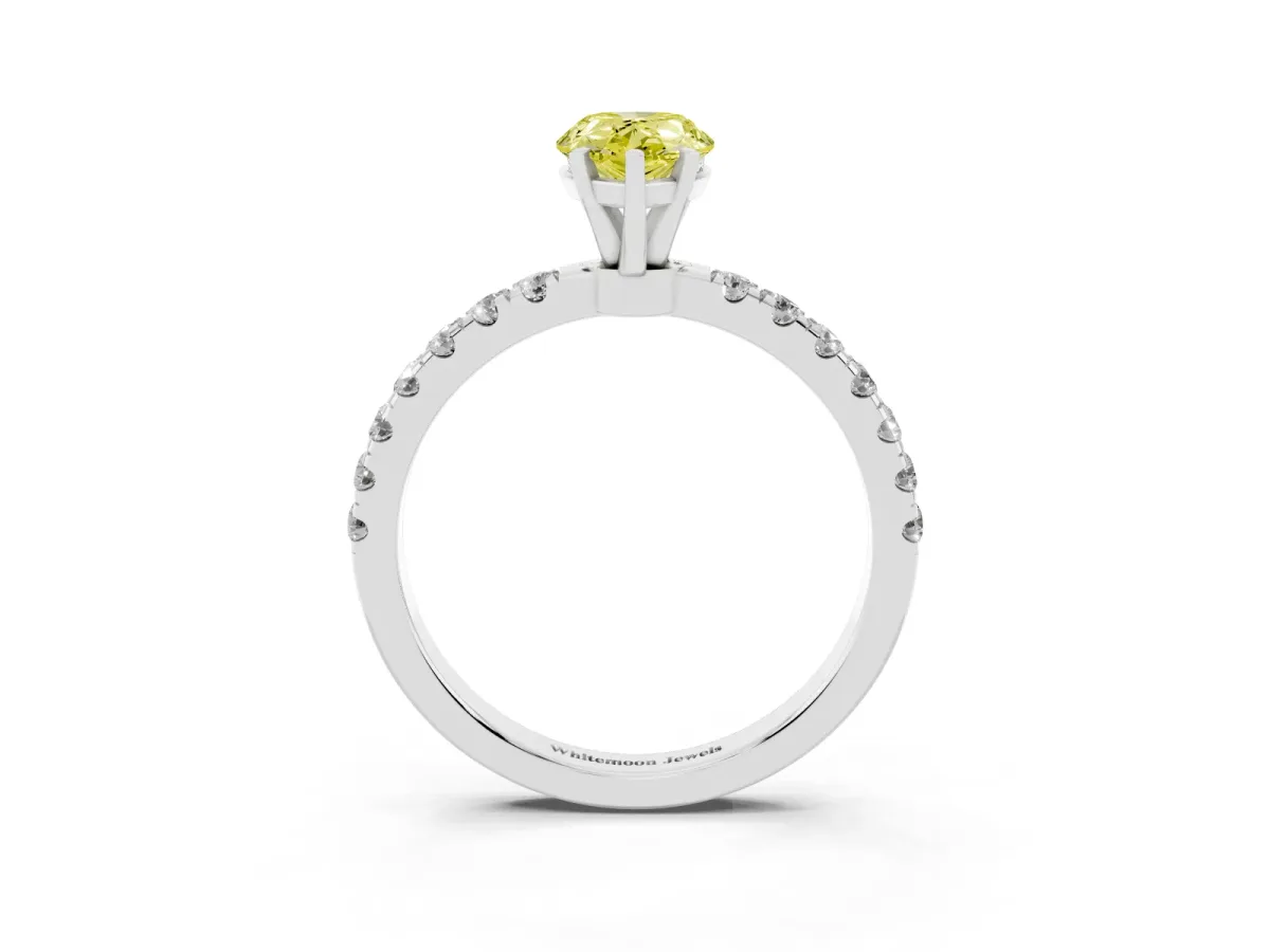 Fancy Yellow Pear Cut Diamond Solitaire Ring with Pavé Accents and Four-Prong Setting Silver