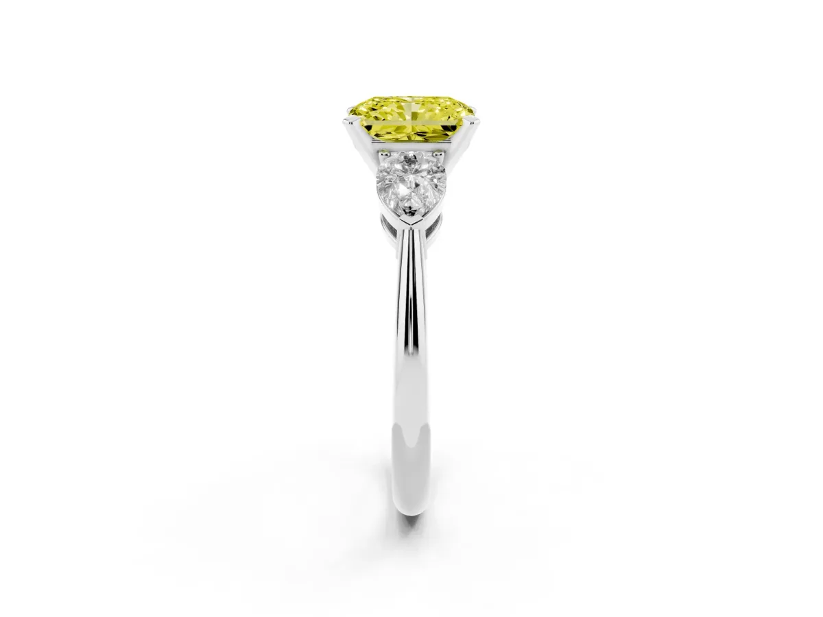 Fancy Yellow Three-Stone Radiant Cut Diamond Ring with Pear Side Stones and Four-Prong Setting Silver