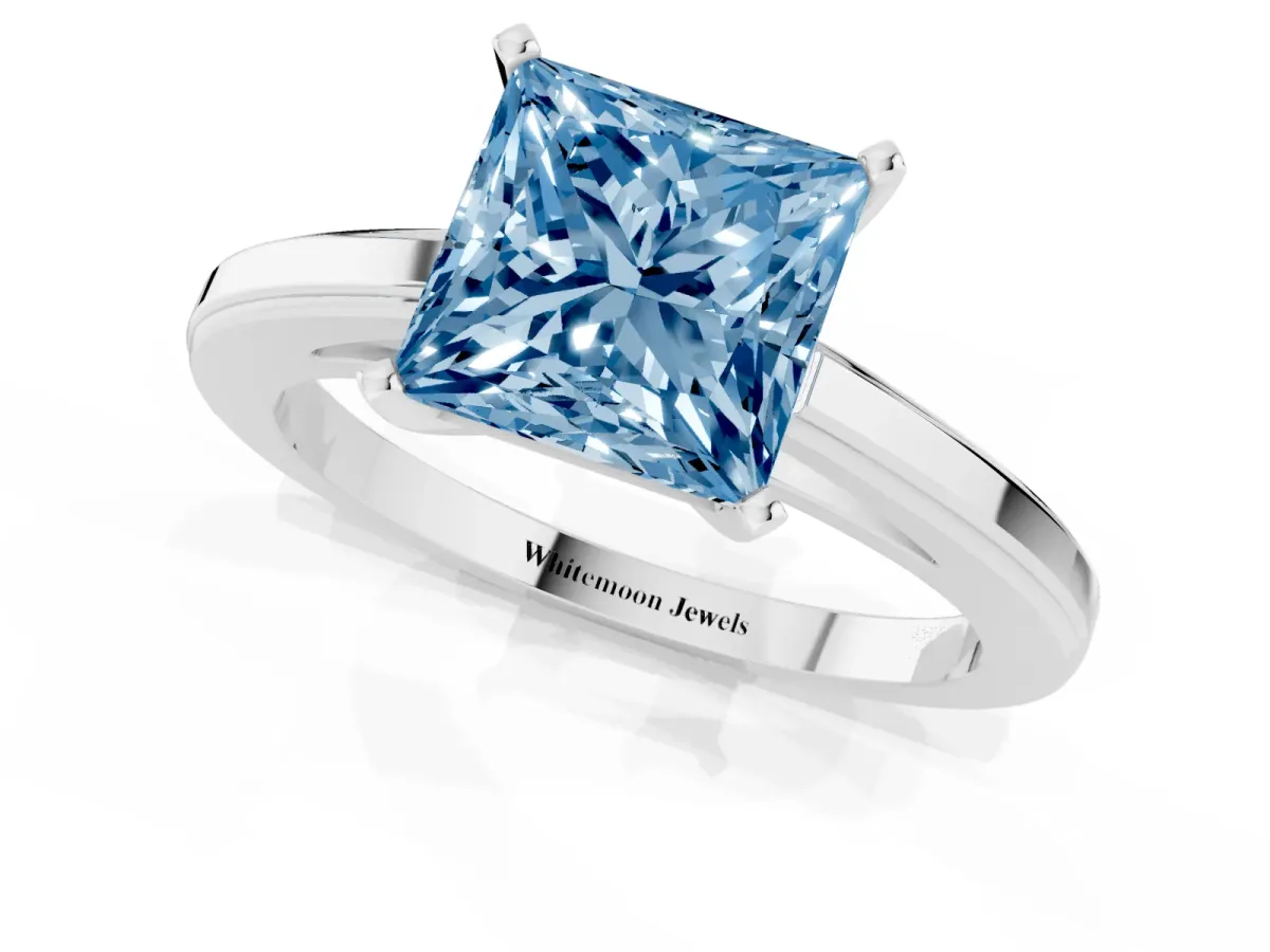 Fancy Blue Princess Cut Solitaire Diamond Ring with Four-Prong Setting and Classic Band Platinum
