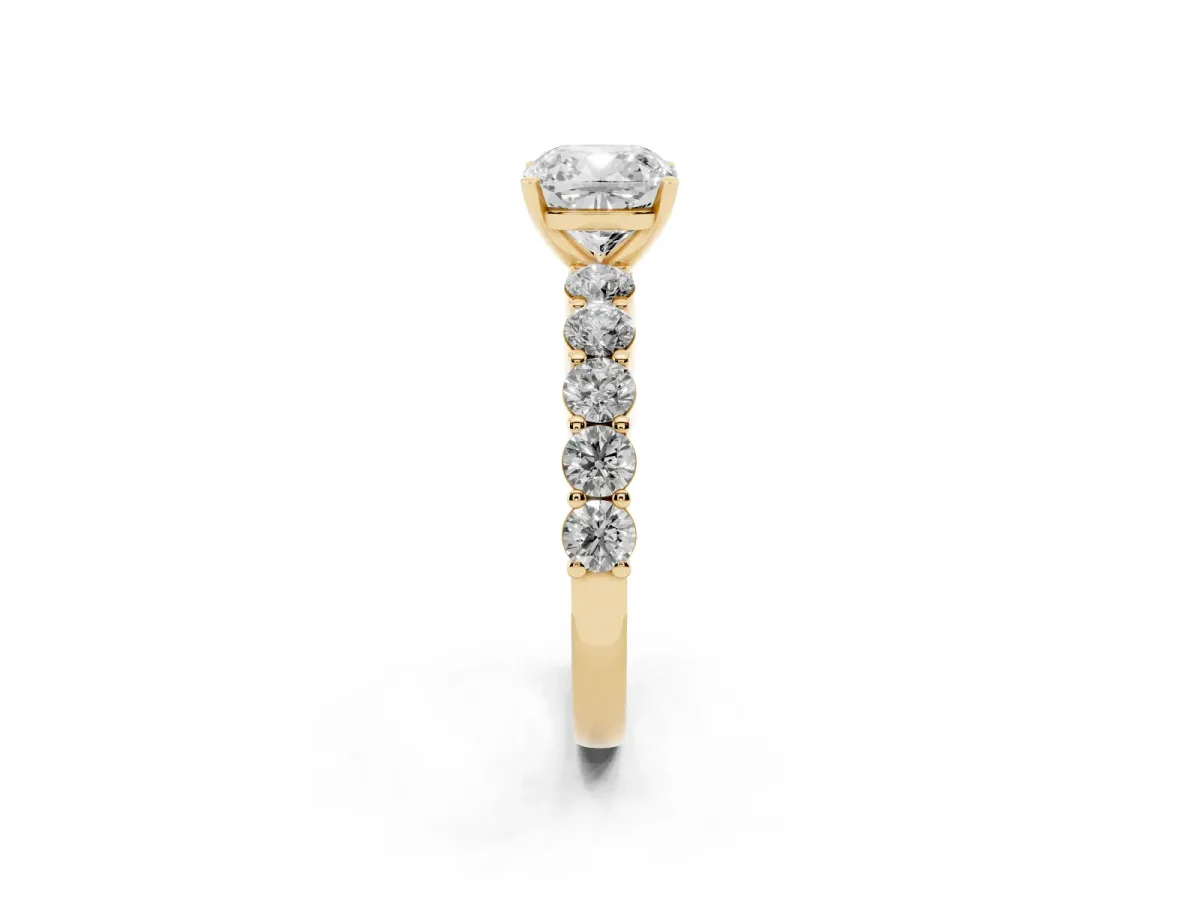 Cushion Cut Diamond Solitaire Ring with Shared Prong Round Side Stones Yellow gold