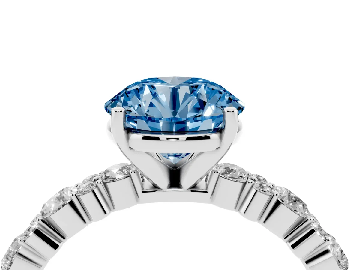 Fancy Blue Round Cut Diamond Side Stone Solitaire Ring with Round and Four-Prong Setting Silver