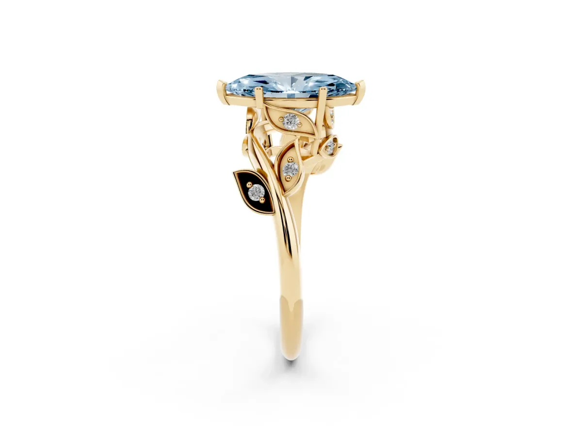 Fancy Blue Marquise Cut Solitaire Twist Engagement Ring with Leaf Accents and Prong Setting Yellow gold