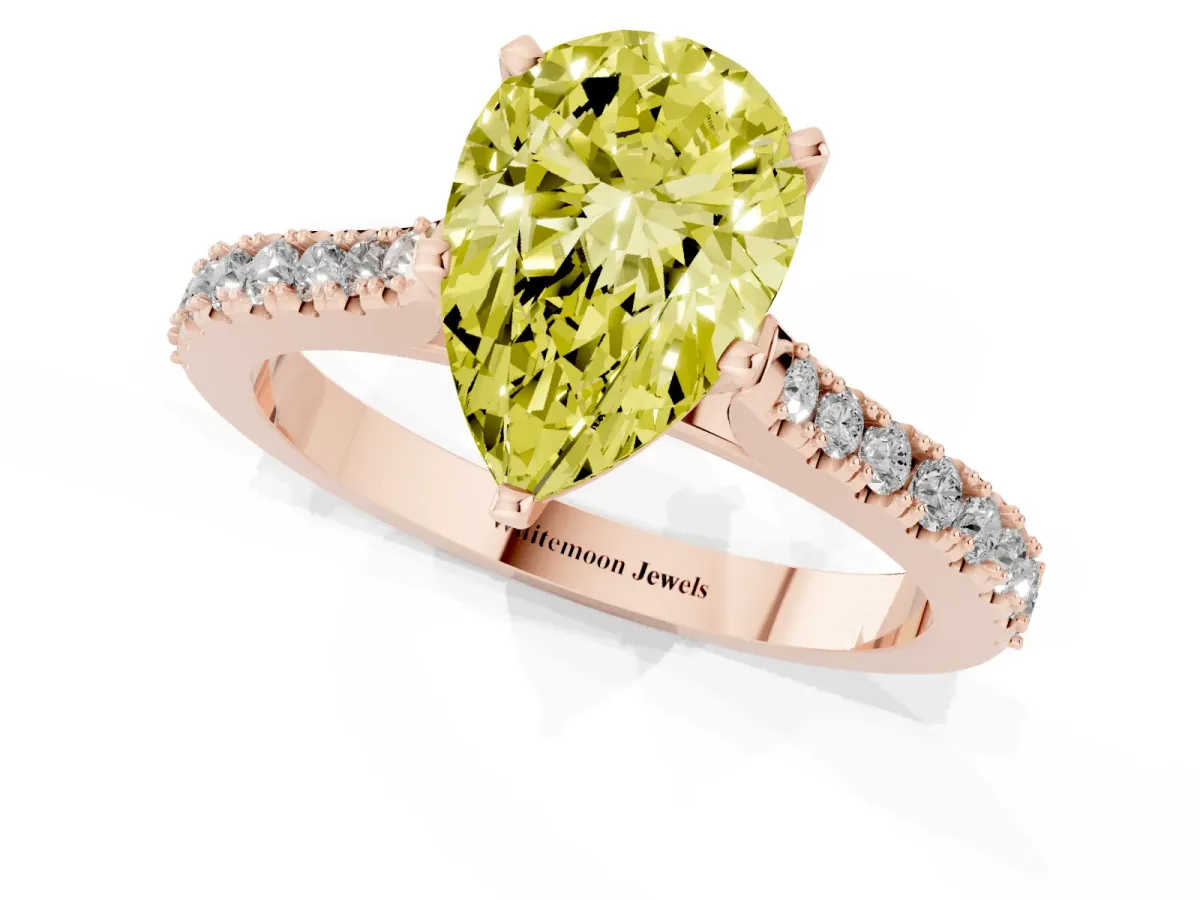 Fancy Yellow Pear Cut Cut Solitaire Diamond Engagement Ring with Pave Band and Four-Prong Setting Rose gold