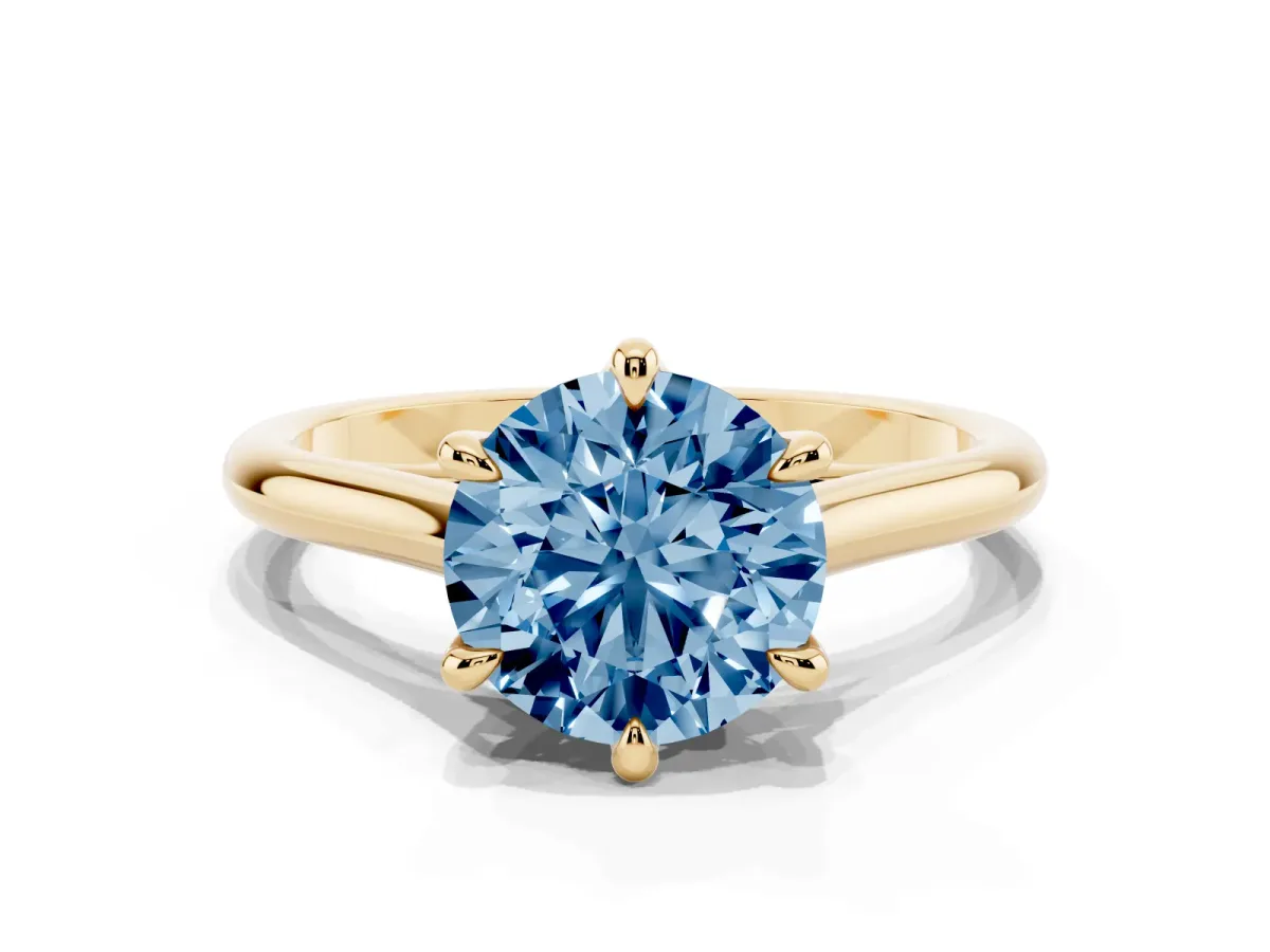 Fancy Blue Round Cut Solitaire Engagement Ring with Six-Prong Setting and Classic Band Yellow gold