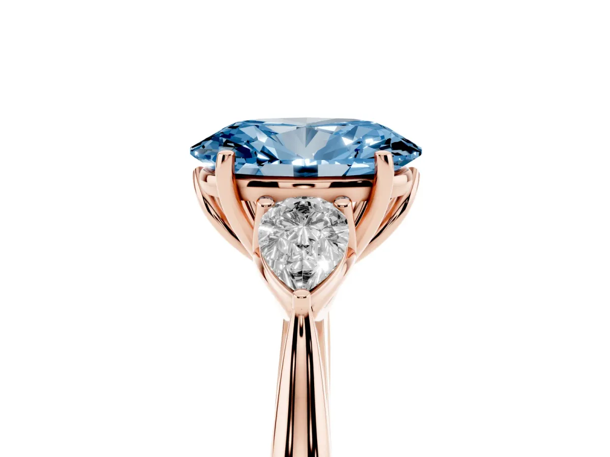 Fancy Blue Oval Cut Diamond Three-Stone Ring with Pear Side Stones and Prong Setting Rose gold