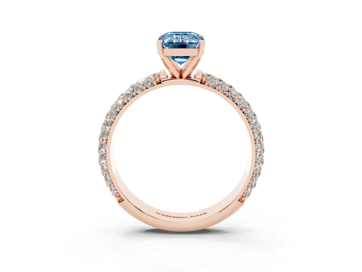 Fancy Blue Emerald Cut Diamond Solitaire Ring with Prong Setting and Pavé Band Rose gold