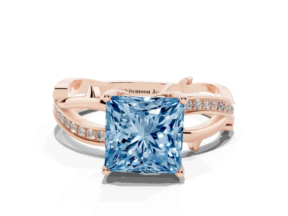 Fancy Blue Princess Cut Solitaire Twist Band with Pavé Accents and Four-Prong Setting Rose gold