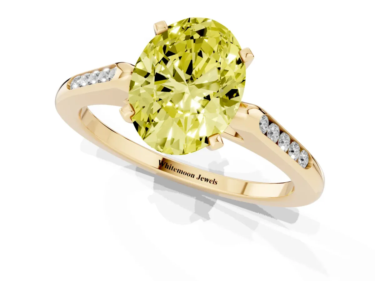 Fancy Yellow Oval Cut Diamond Solitaire Ring with Channel Set Round Band and Prong Setting Yellow gold
