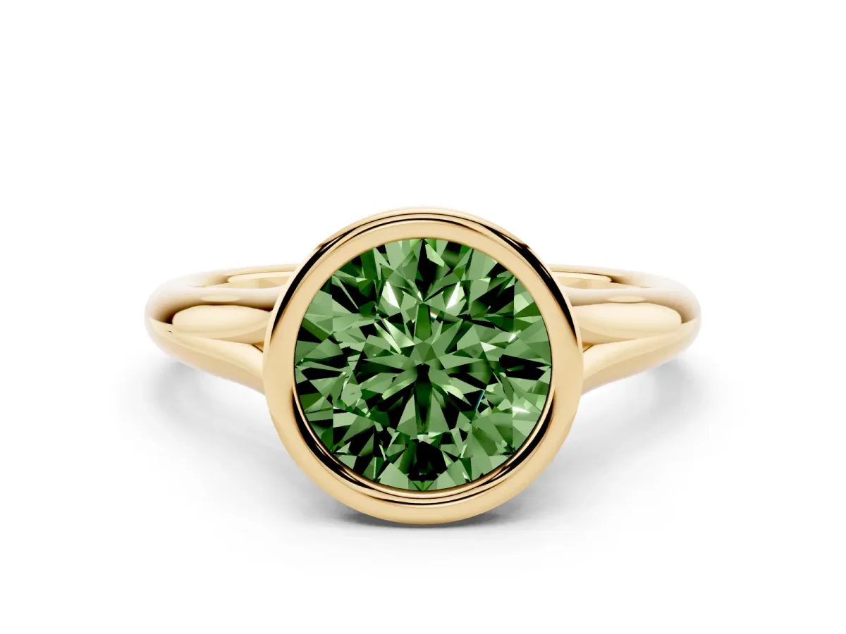 Fancy Green Bezel Set Round Cut Solitaire Diamond Ring with Smooth Band Yellow gold