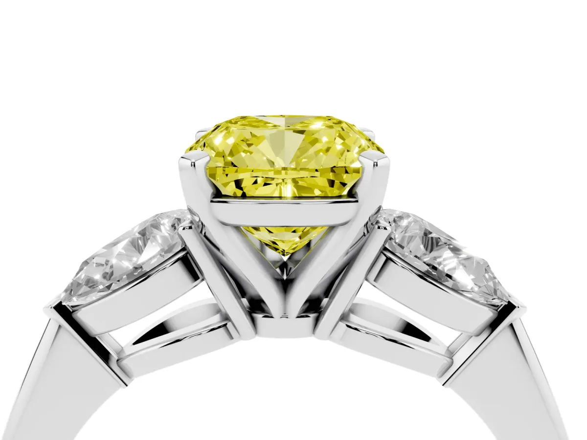 Fancy Yellow Three-Stone Cushion Cut Diamond Ring with Pear Side Stones and Four-Prong Setting Silver