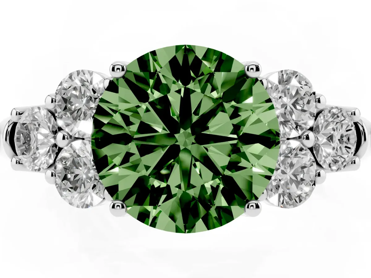 Fancy Green Round Cut Cut Diamond Cluster Ring with Round Accent Stones and Prong Setting on a Classic Band Silver