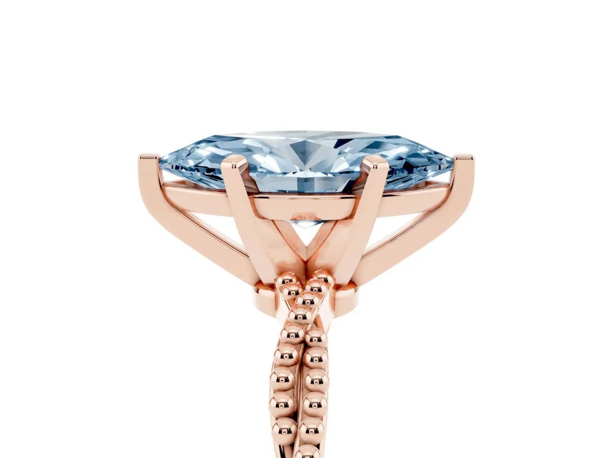 Fancy Blue Marquise Cut Solitaire Twisted Band with Bead Prong Setting Rose gold
