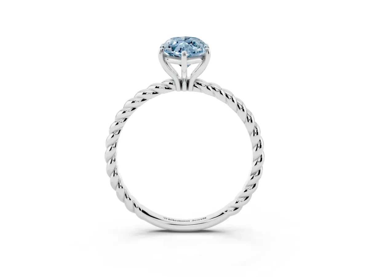 Fancy Blue Marquise Cut Solitaire Twist Band Ring with Four-Prong Setting Silver