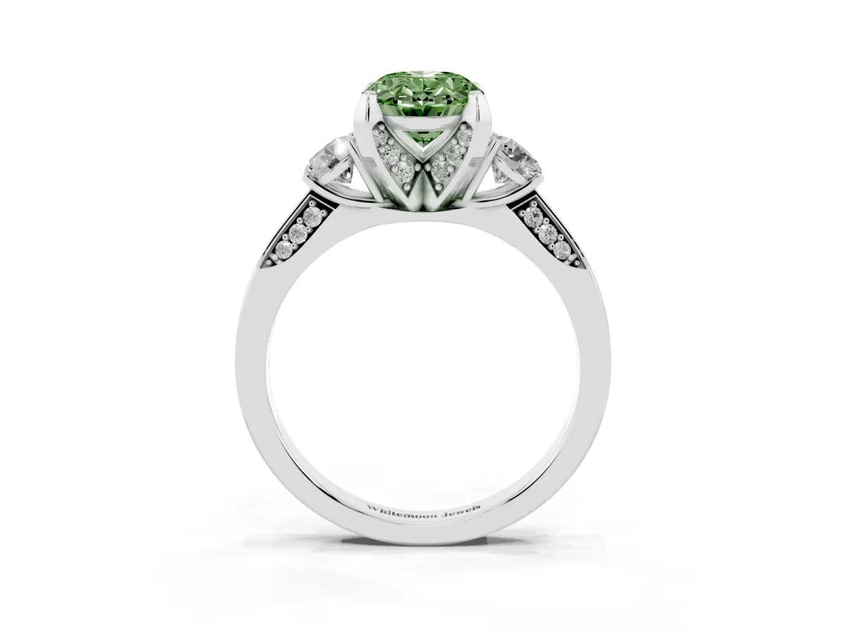 Fancy Green Oval Cut Brilliant Three-Stone Diamond Ring with Pavé Band and Four-Prong Setting White gold