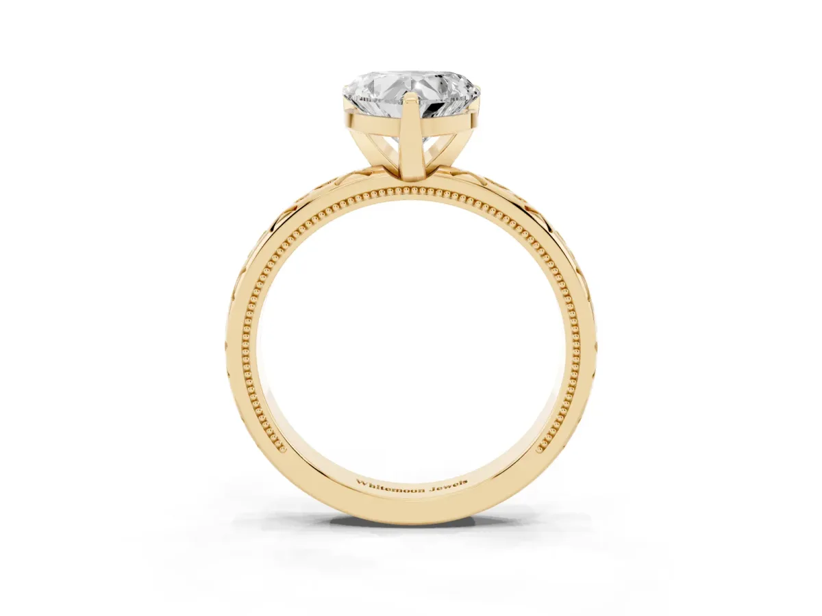 Heart Cut Solitaire Engagement Ring with Scrollwork Band and Four-Prong Setting Yellow gold