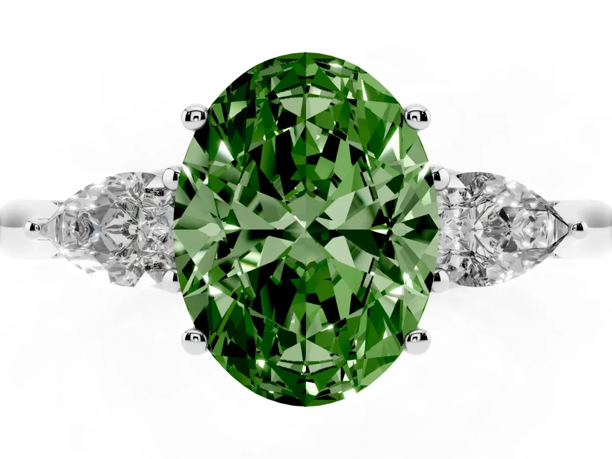 Fancy Green Three-Stone Oval Cut Diamond Ring with Pear Side Stones in Four-Prong Setting Platinum