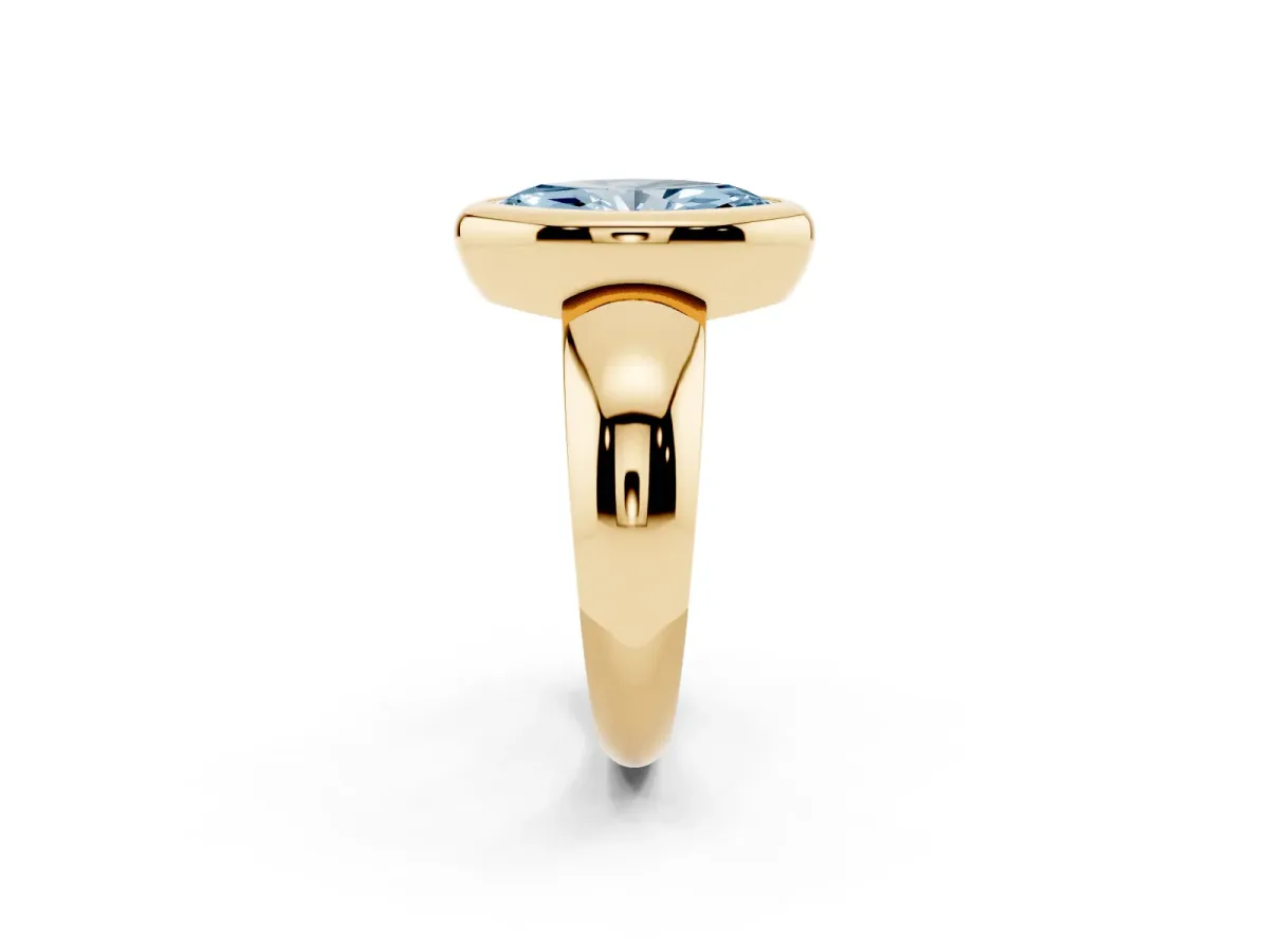 Fancy Blue Bezel Set Marquise Cut Solitaire Ring with Wide Band Yellow gold