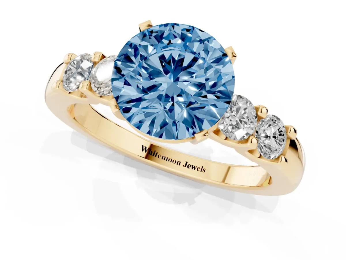 Fancy Blue Round Cut Brilliant Cut Diamond Five-Stone Prong Set Engagement Ring with Channel Band Yellow gold