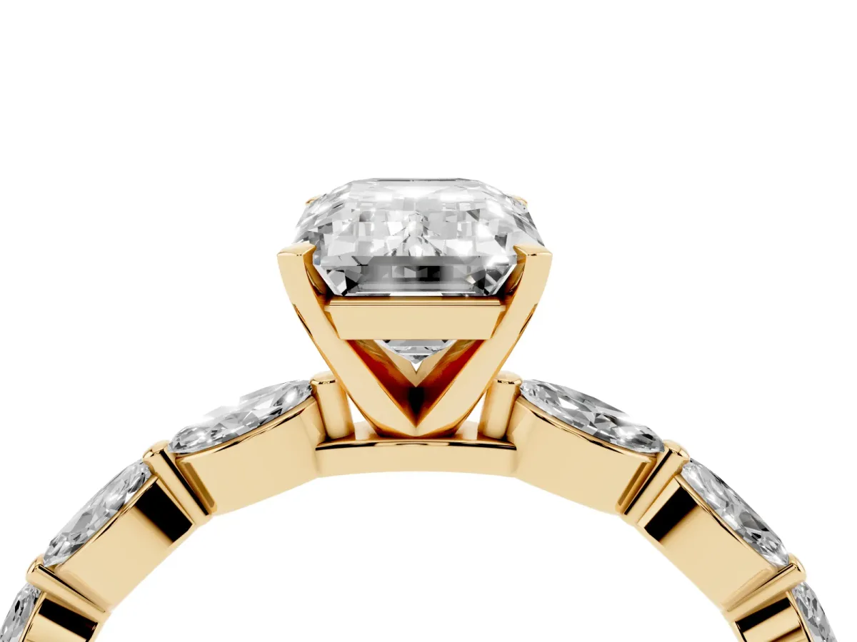 Emerald Cut Diamond Ring with Marquise Side Stones and Prong Setting Yellow gold