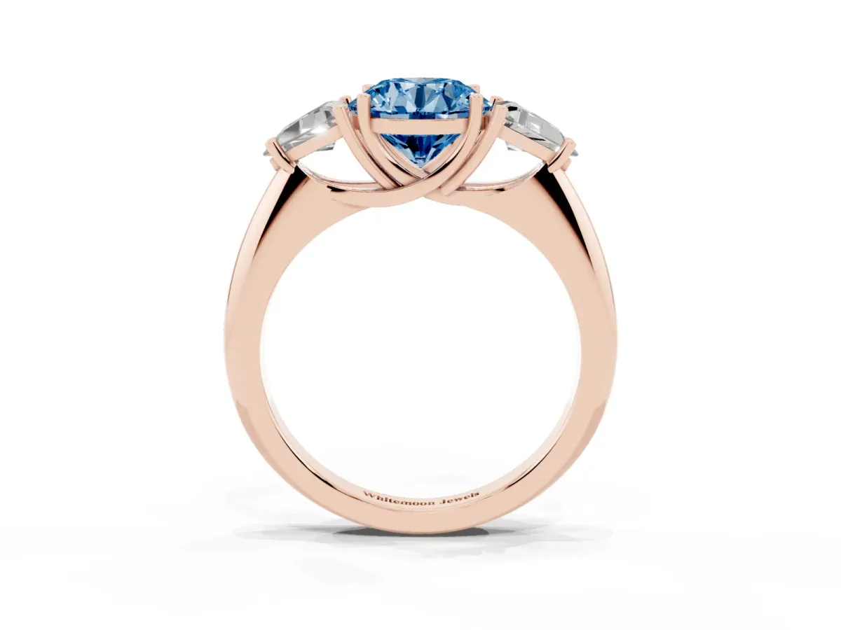 Fancy Blue Three-Stone Round Cut Diamond Engagement Ring with Trillion Side Stones and Prong Setting Rose gold