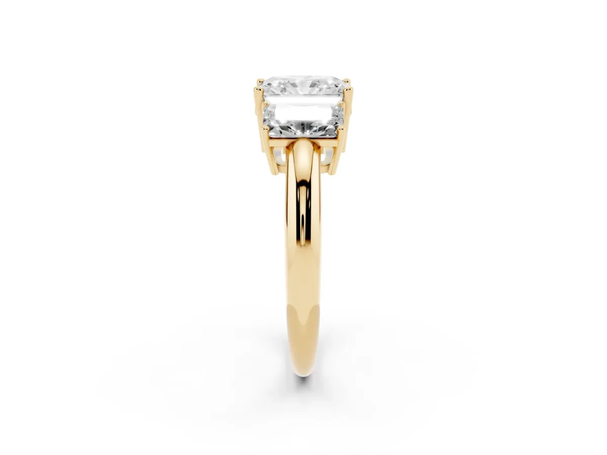 Three-Stone Radiant Cut Cut Diamond Engagement Ring with Prong Setting on a White Gold Band Yellow gold
