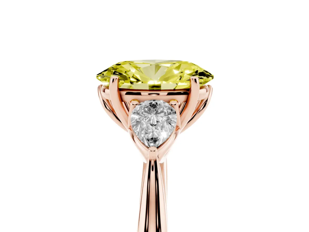 Fancy Yellow Three-Stone Oval Cut Diamond Ring with Pear Side Stones in Four-Prong Setting Rose gold