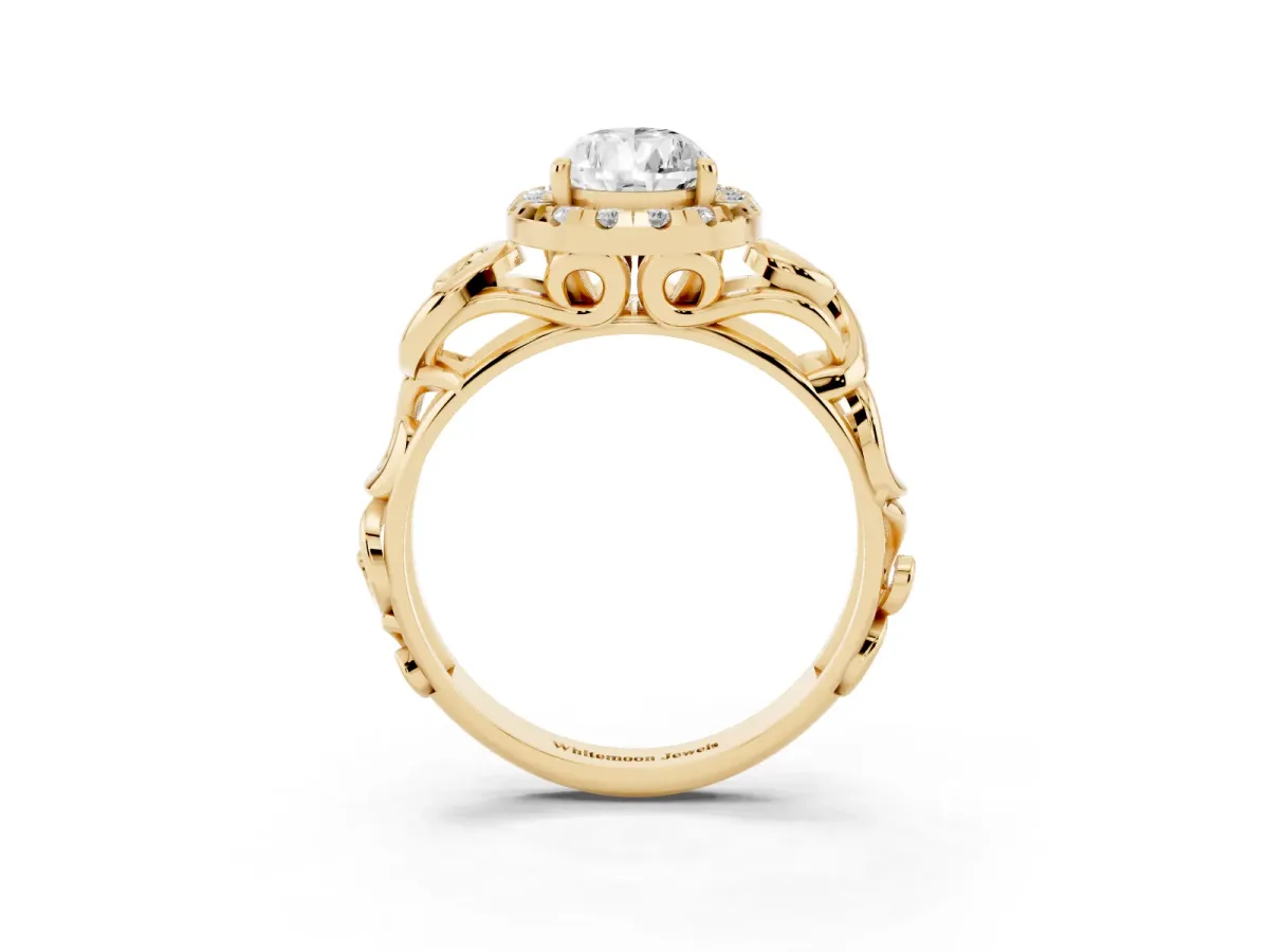 Pear Cut Cut Halo Diamond Ring with Scrollwork Band and Four-Prong Setting Yellow gold