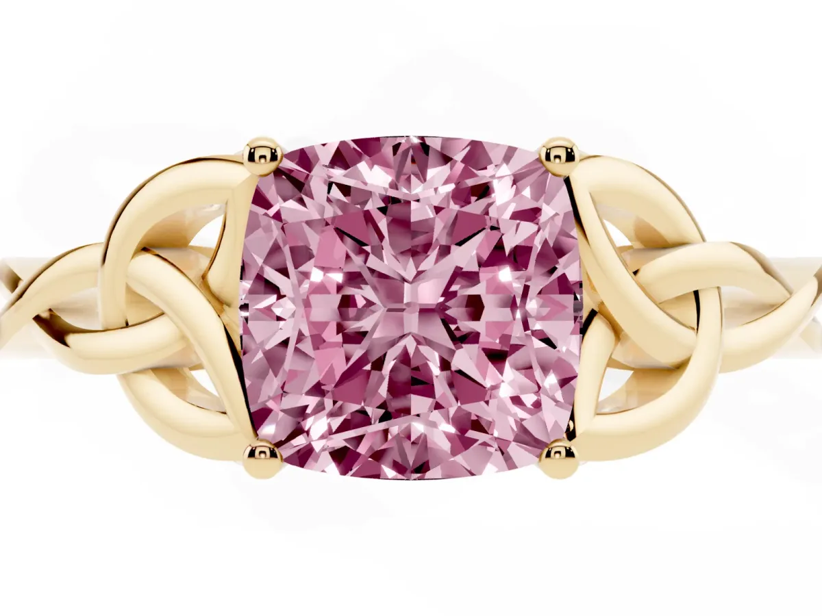 Fancy Pink Cushion Cut Diamond Solitaire Engagement Ring with Celtic Knot Band and Four-Prong Setting Yellow gold