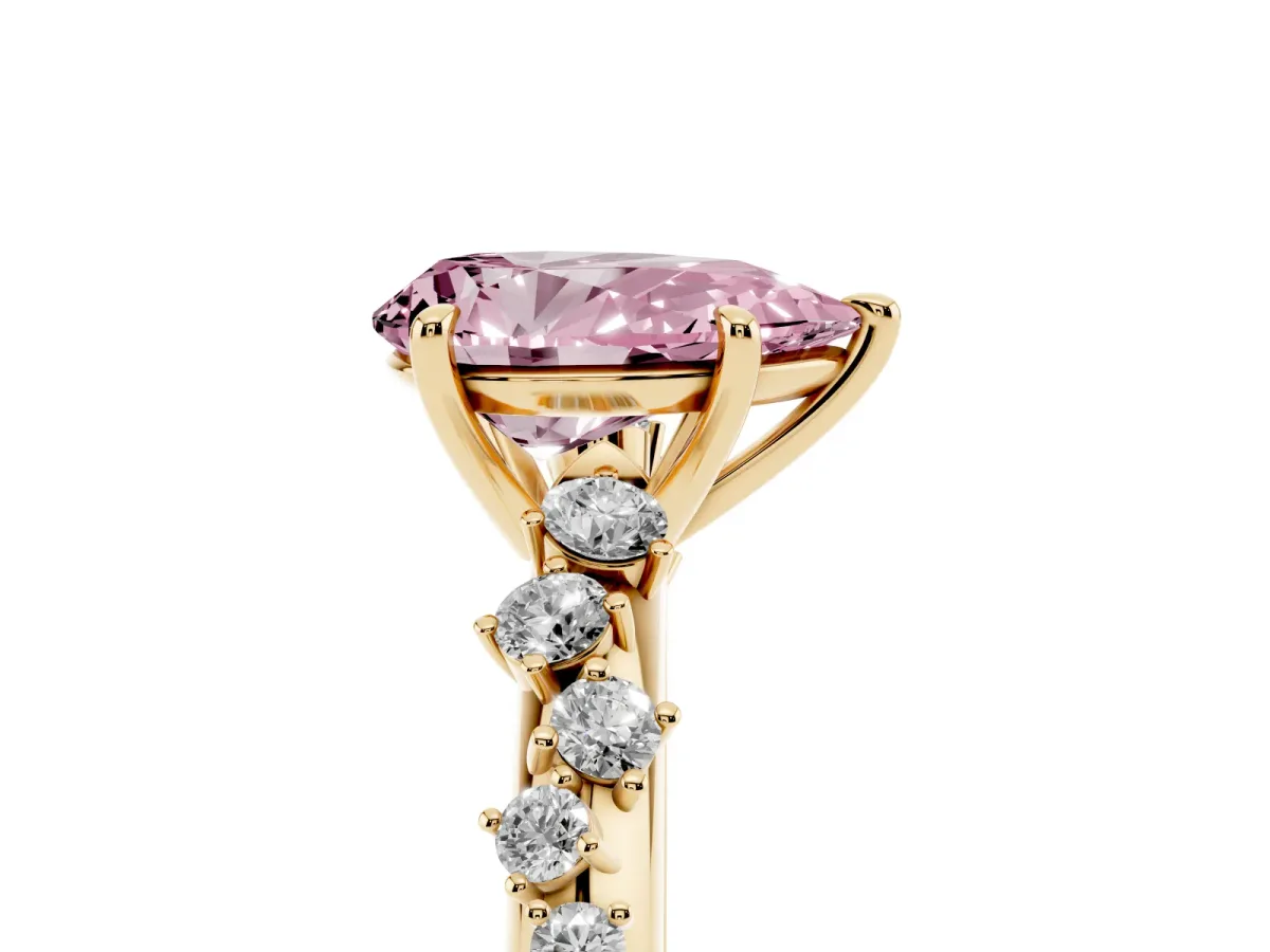 Fancy Pink Pear Cut Diamond Cluster Side Stone Solitaire Ring with Prong Setting Yellow gold
