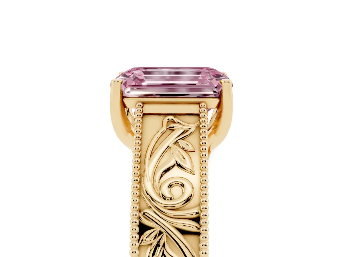 Fancy Pink Emerald Cut Diamond Solitaire Ring with Engraved Band and Four-Prong Setting Yellow gold