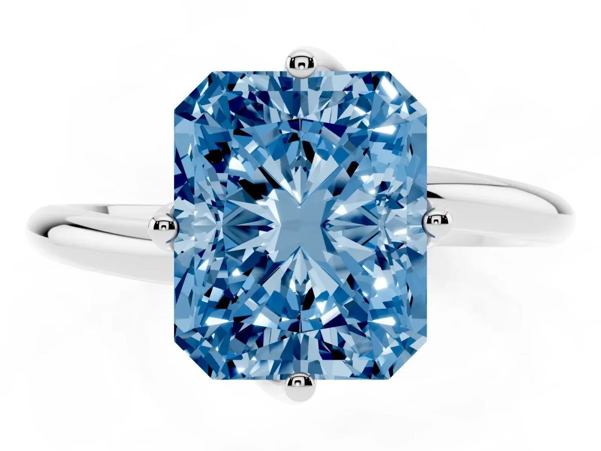 Fancy Blue Radiant Cut Diamond Solitaire Engagement Ring with Four-Prong Setting and Classic Band Silver