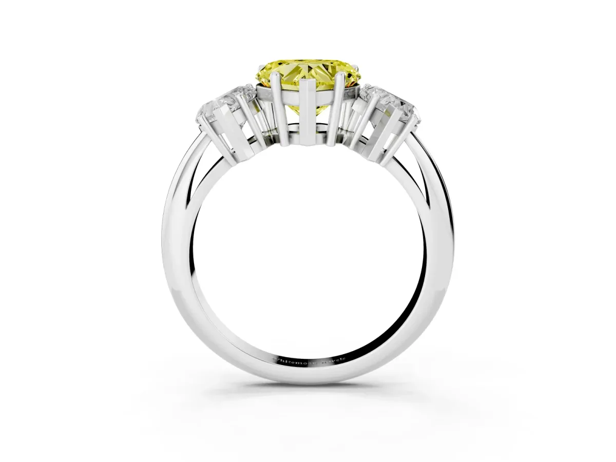 Fancy Yellow Three-Stone Heart Cut Cut Diamond Engagement Ring with Prong Setting on a White Gold Band Silver
