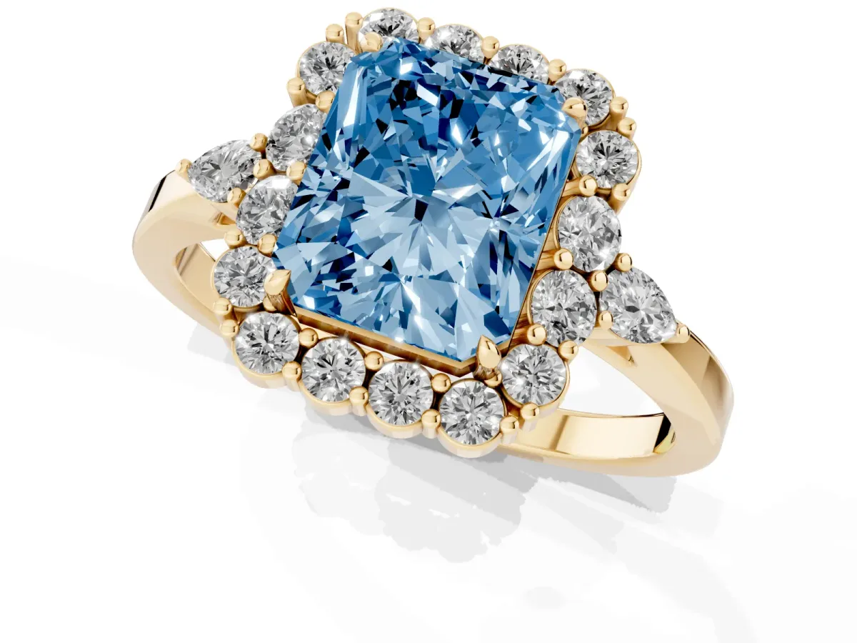 Fancy Blue Radiant Cut Diamond Halo Ring with Pear Side Stones and Prong Setting Yellow gold