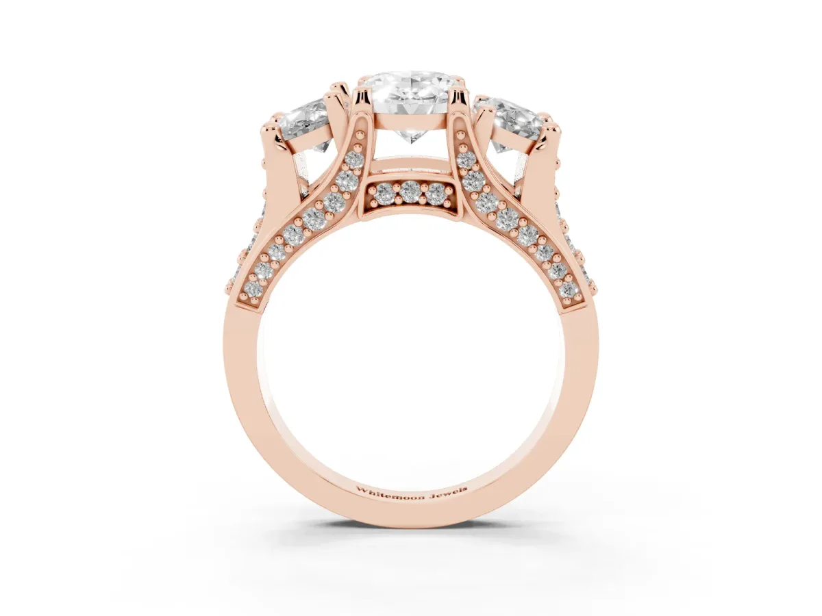 Oval Cut Diamond Three-Stone Ring with Channel Set Band and Four-Prong Setting Rose gold