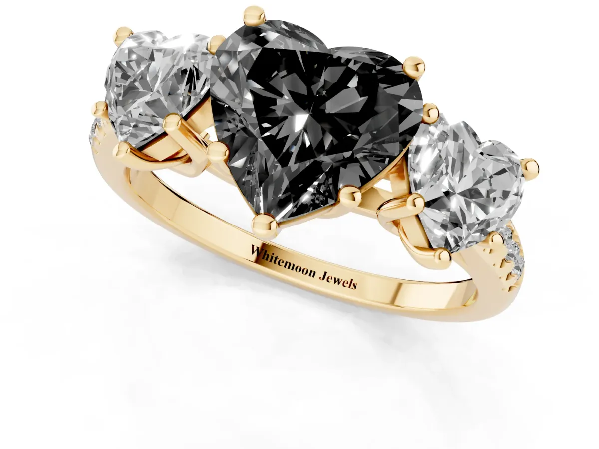 Fancy Black Three-Stone Heart Cut Diamond Ring with Round Pavé Band and Prong Setting Yellow gold
