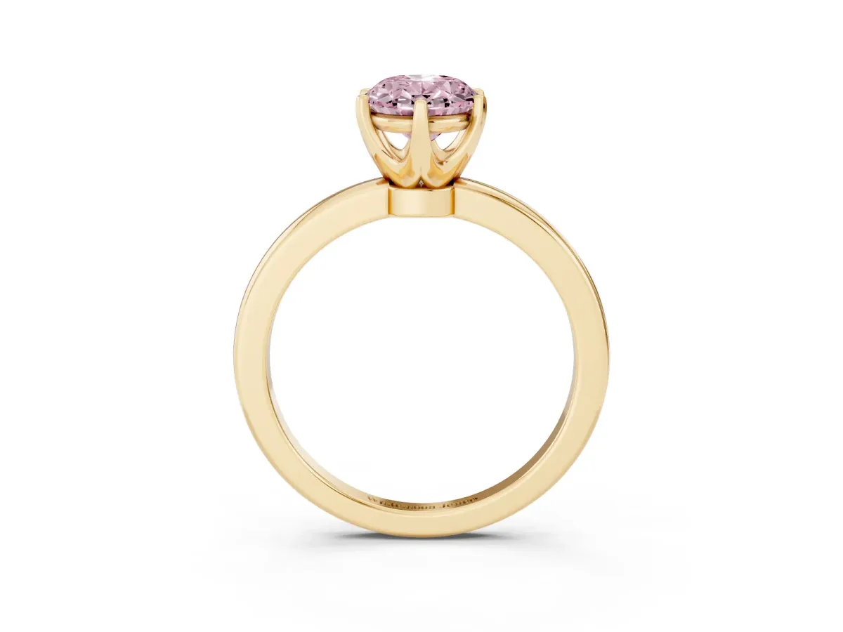 Fancy Pink Oval Cut Solitaire Diamond Ring with Six-Prong Setting on a Classic Band Yellow gold