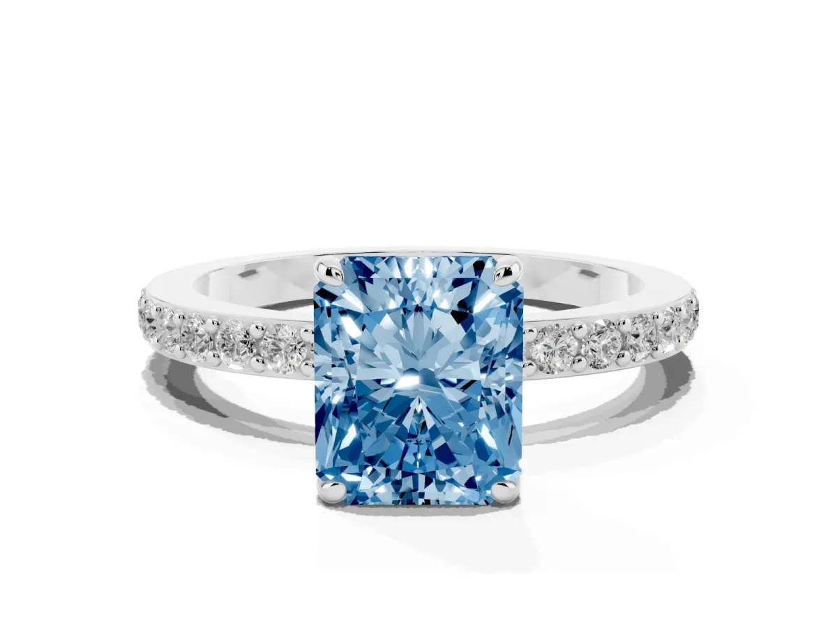 Fancy Blue Radiant Cut Diamond Pavé Engagement Ring with Round Accents and Prong Setting Silver
